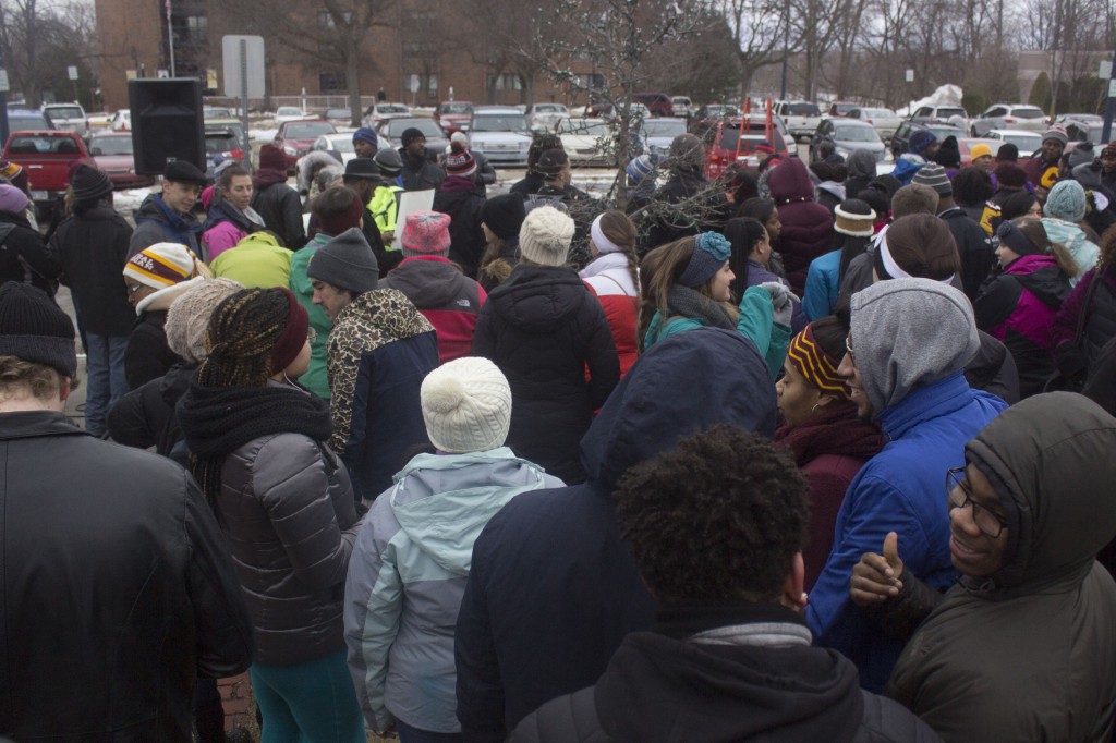 Central Michigan University students and Mount Pleasant community members march at the Dr. Martin Luther King Jr. Peace March and Vigil on January 19, 2015. (Photo I Max Barth) 