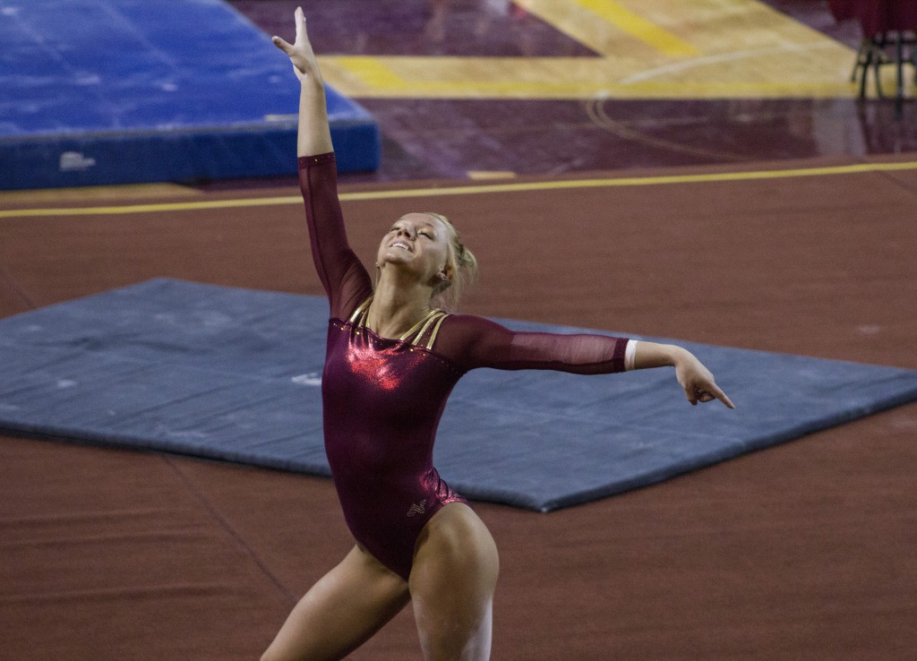 Kirsten Petzold competes in the floor exercise during a meet against NIU in McGuirk Arena, on the campus of Central Michigan University, Mount Pleasant, Michigan, Friday, February 6, 2015. (Photo I Rich Drummond)