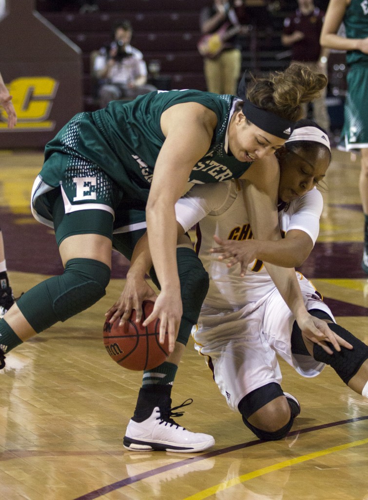 Central Michigan's Da'Jourie Turner's, (1), dives for the ball against Eastern Michigan's Brianna Puni. (Photo I Rich Drummond)