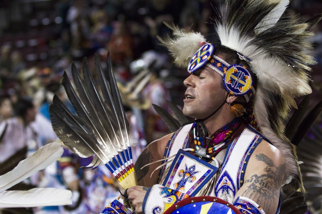 Shane Mitchell dances in his regalia during the Anishinaabe Pow wow in McGuirk Arena. (Photo I Rich Drummond) 