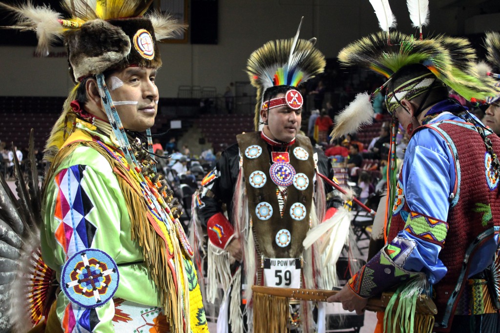 Dancers gather around McGuirk Arena and the 26th Annual Celebrating Life Pow wow in regalia. (Photo I Julie Frederick)