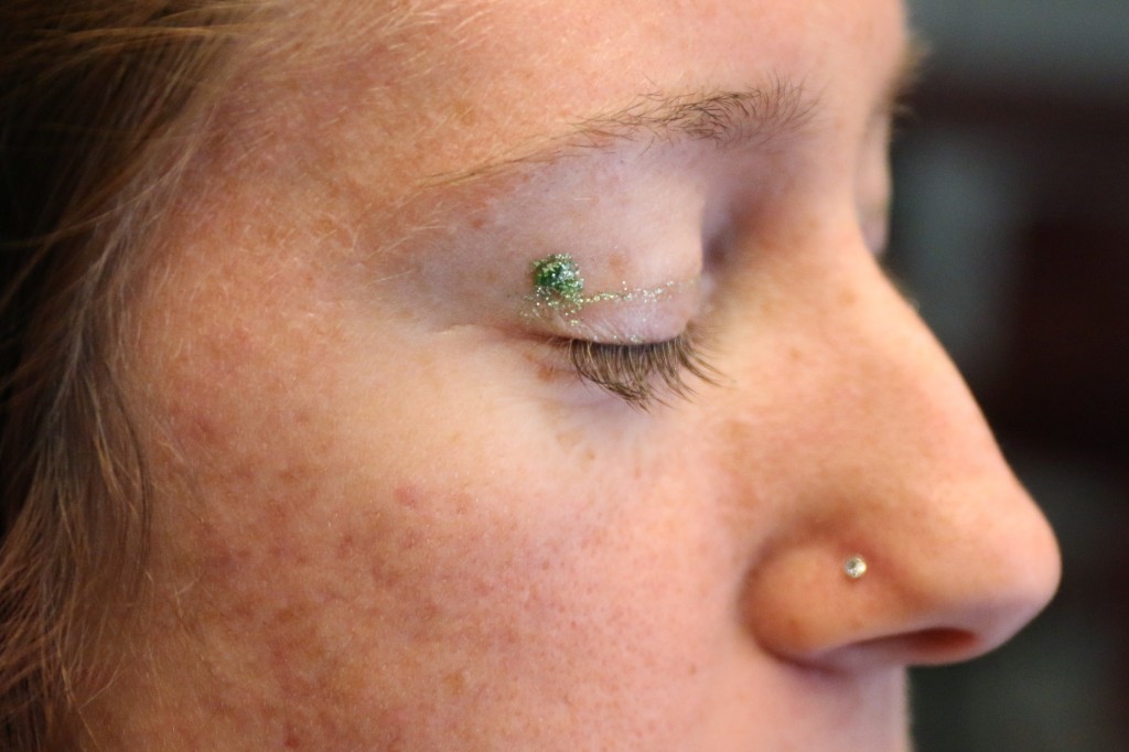 Morgan Taylor shows a little green sparkle on her eye in honor of the St. Patrick's day festivities on March 17, 2015. (Photo I Kaiti Chritz) 