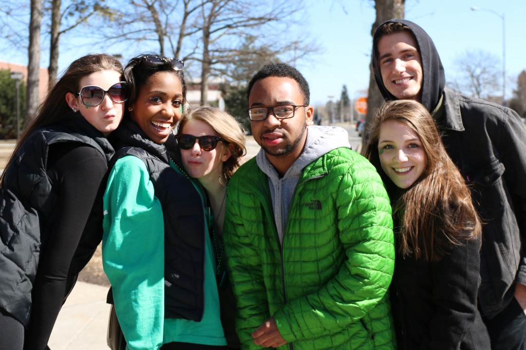 Taylor Johnson, Whitney Johnson, Mary Shirk, Ranshaan Norris, Lauren Kelly, and Zachary Smith pose for a picture sporting green clothes for the Holiday. (Photo I Kaiti Chritz) 