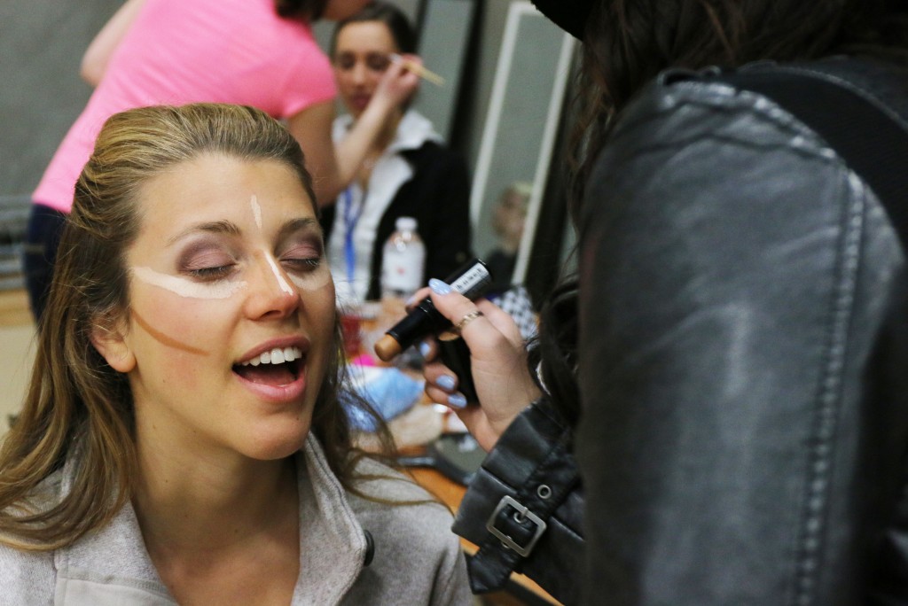 Delaney Dillon, a model at the 2015 Threads Fashion Show, gets her makeup done before the show Saturday, April 25, 2015. (Photo I Kaiti Chritz)