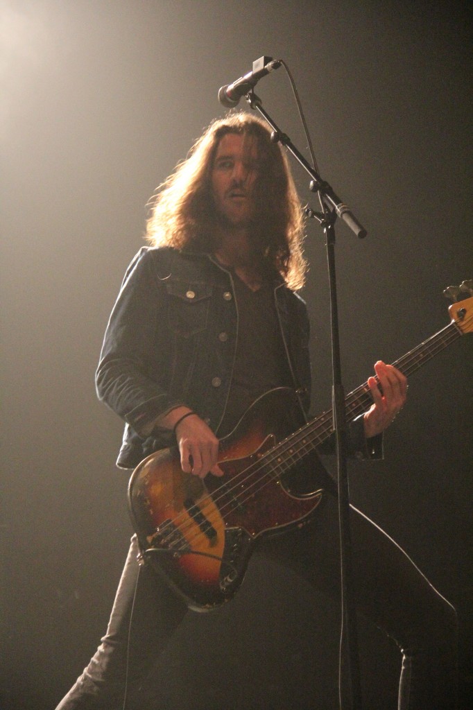 Alex LeCavalier plays the bass guitar during Third Eye Blind's set in the McGuirk Arena on the campus of Central Michigan University, Friday, October 2, 2015.