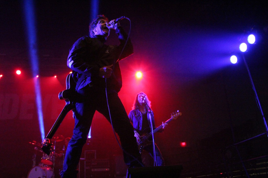 Third Eye blind members, Stephan Jenkins (left) and Alex LeCavalier (right), sing on stage in the McGuirk Arena on the campus of Central Michigan University, Friday, October 2, 2015.