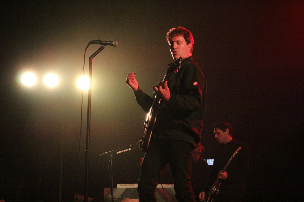 Stephan Jenkins (left) plays the guitar with Kryz Reid (right) during CMU's Homcoming concert in the McGuirk Arena on the campus of Central Michigan University, Friday, October 2, 2015.