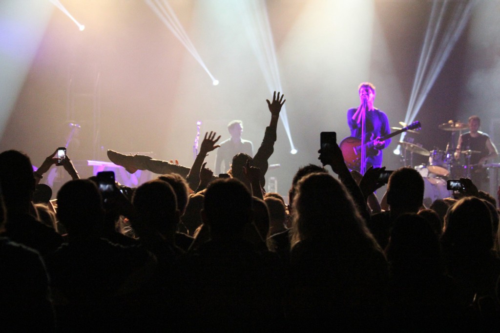 A person crowd surfs during Third Eye Blind's set in the McGuirk Arena on the campus of Central Michigan University, Friday, October 2, 2015.