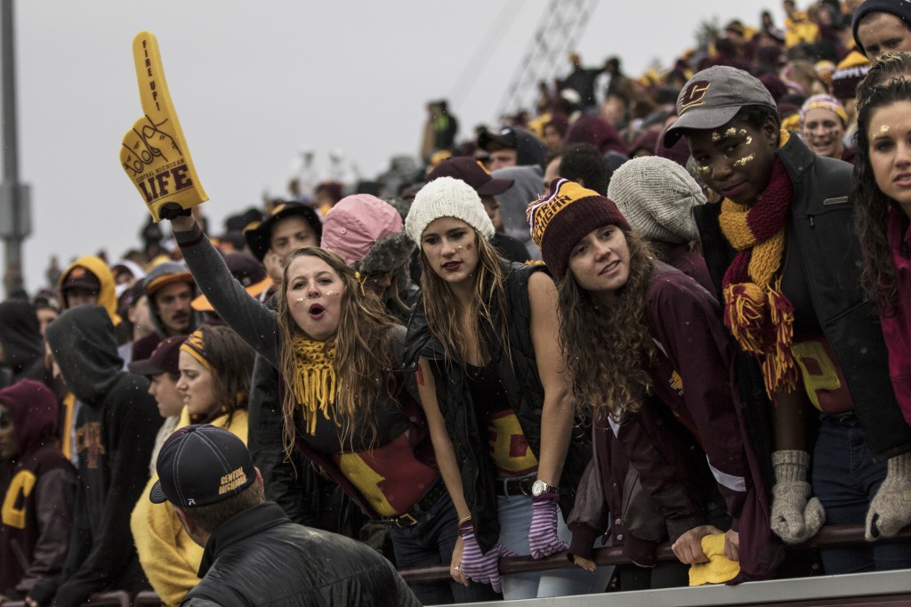 Fans cheer on their Chippewas during the football game against Northern Illinois University on the campus of Central Michigan University, Mt. Pleasant, MI, Sunday, October 3, 2015.