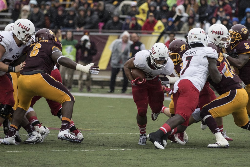Jeffery Hill, 28, cuts through the hole during the football game against Northern Illinois University on the campus of Central Michigan University, Mt. Pleasant, MI, Sunday, October 3, 2015.