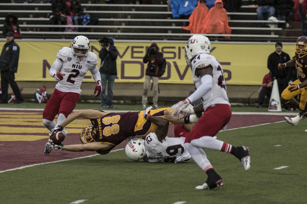 Jesse Kroll, 88, stretches for a touchdown during the football game against Northern Illinois University on the campus of Central Michigan University, Mt. Pleasant, MI, Sunday, October 3, 2015.