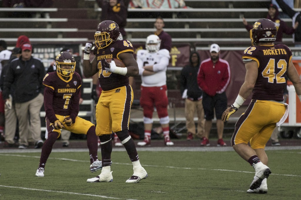 Tim Hamilton, 43, celebrates an interception during the football game against Northern Illinois University on the campus of Central Michigan University, Mt. Pleasant, MI, Sunday, October 3, 2015.
