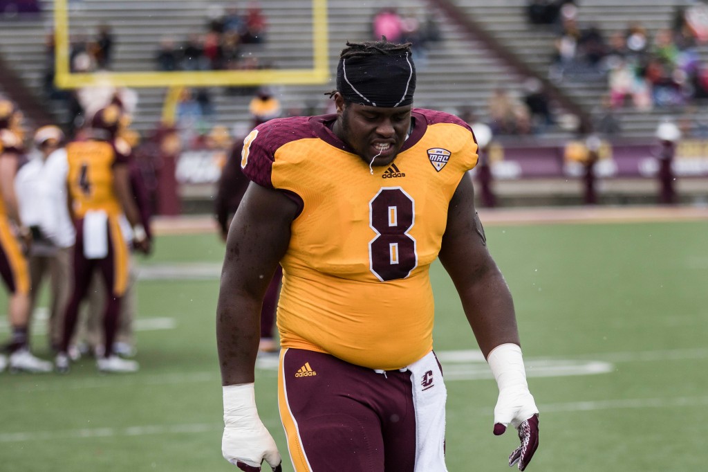 Louis Palmer spits on the turf during the football game against the University at Buffalo on the campus of Central Michigan University, Mt. Pleasant, MI, Saturday, October 17, 2015.