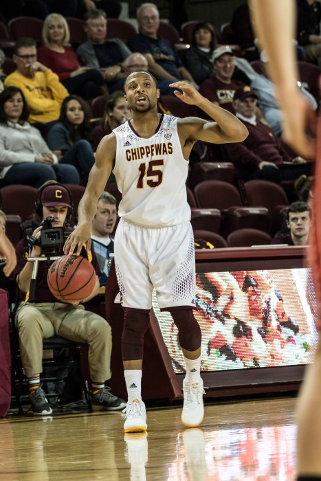 Chris Fowler, 15, sets up the offense during the game against Ferris State University in McGuirk Arena on the campus of Central Michigan University, Mt. Pleasant, Michigan, Saturday, November 7, 2015.