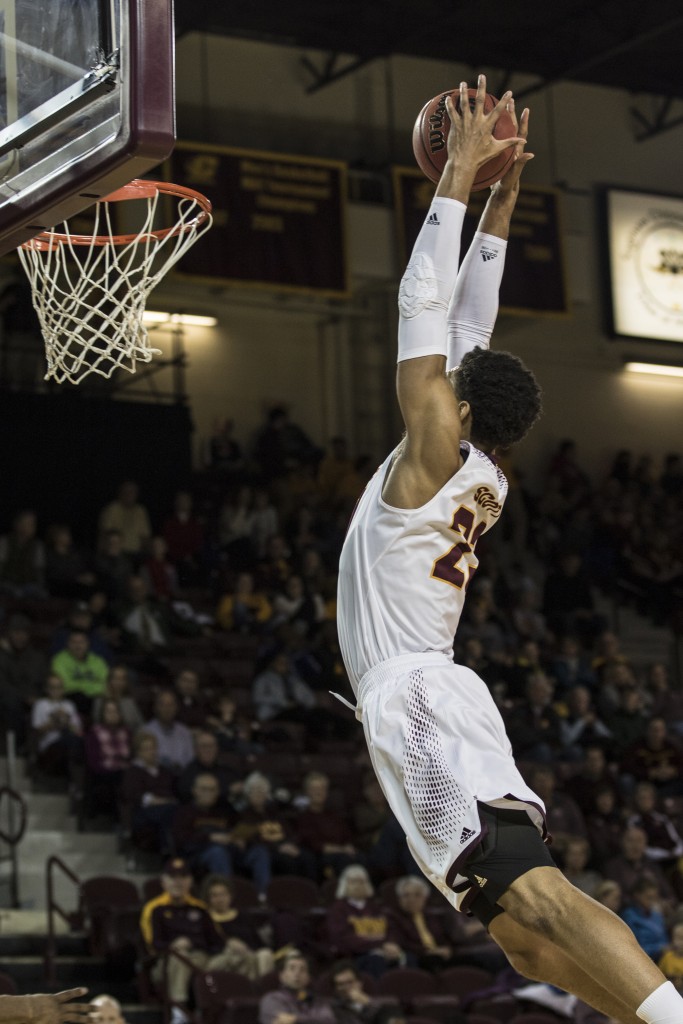 DaRohn Scott, 23, catches the alley oop during the game against Jacksonville State University in McGuirk Arena, on the campus of Central Michigan University, Mt. Pleasant, Michigan, Friday, November 13, 2015.