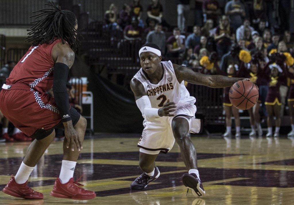 Braylon Rayson, 2, hits Greg Tucker, 1, with a crossover during the game against Jacksonville State University in McGuirk Arena, on the campus of Central Michigan University, Mt. Pleasant, Michigan, Friday, November 13, 2015.