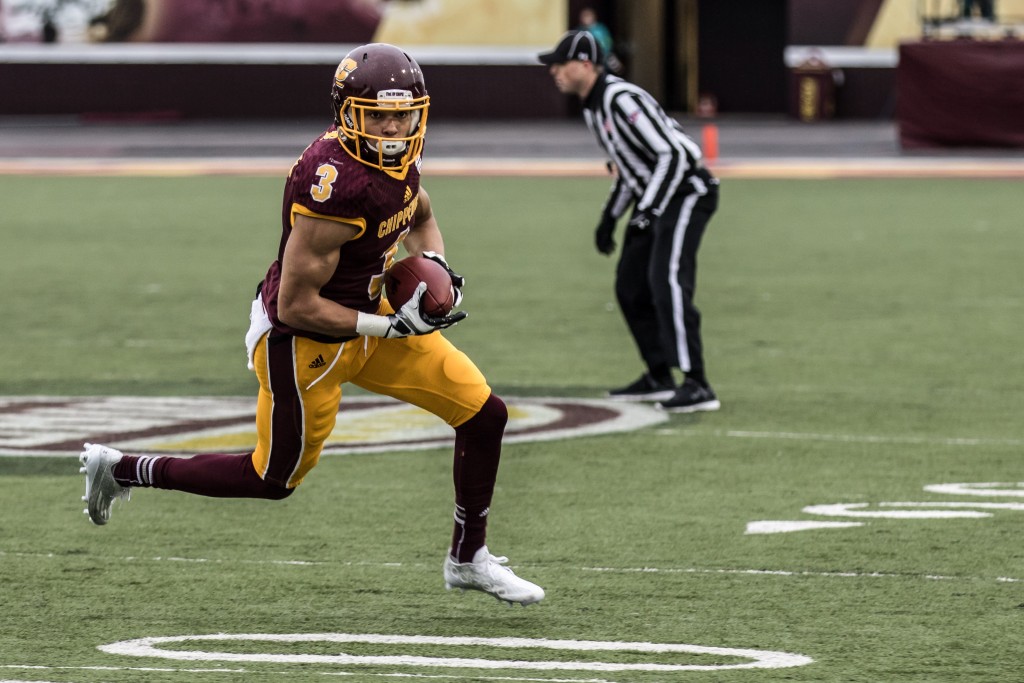 Mark Chapman, 3, looks for open space after a catch during the game against Eastern Michigan University at Kelly / Shorts Stadium on the campus of Central Michigan University, Mt. Pleasant, Michigan, Friday, November 27, 2015.