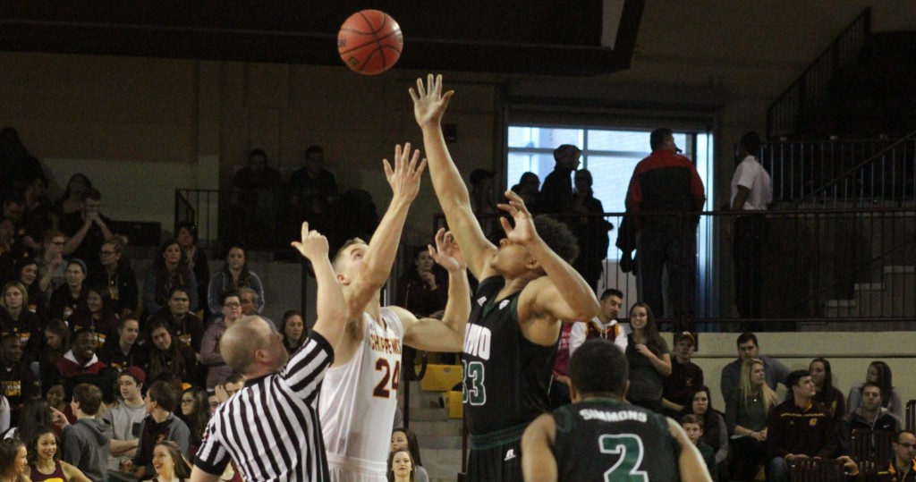 Forward Luke Meyer (24) takes tip-off to start the game in the 72-49 victory against Ohio University.
