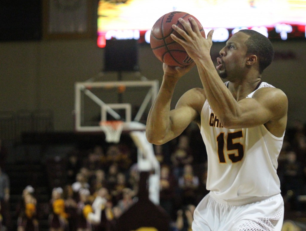 Guard Chris Fowler (15) shoots a three pointer in the 88-61 win against Kent State at McGurick Arena on the campus of Central Michigan University on February 3, 2016.