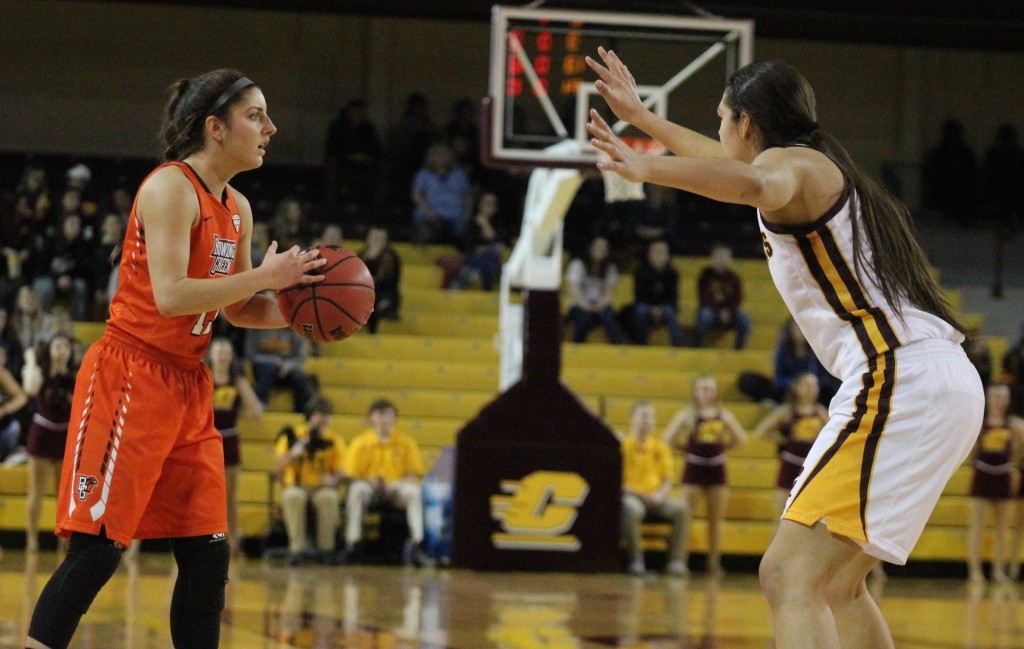 Forward Reyna Frost defends the three point line in the 76-75 win against Bowling Green at McGurick Arena on the campus of Central Michigan University on Feb. 6, 2016.