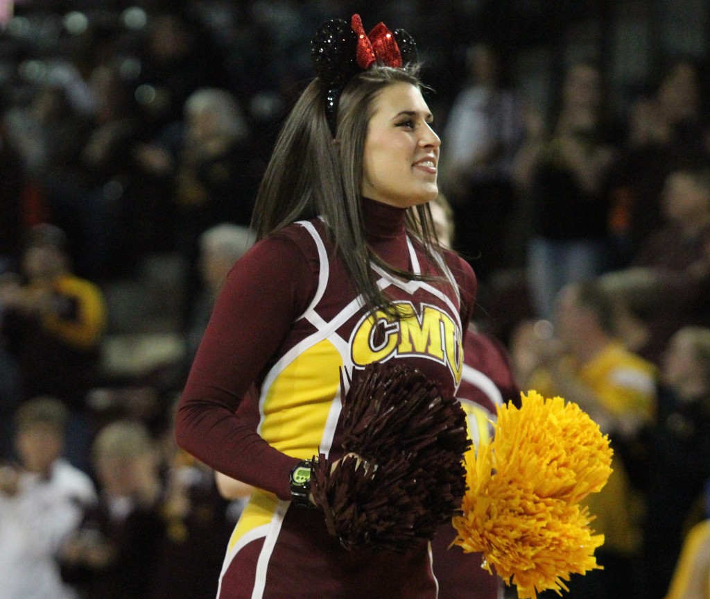 Cheeleader Maddy Miller wears Mickey Mouse ears on Disney Day at McGurick Arena on the campus of Central Michigan University on Feb. 6, 2016.